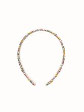 Load image into Gallery viewer, Floral patterned headband on a white background