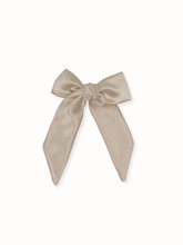 Load image into Gallery viewer, Beige bow hair accessory on a white background
